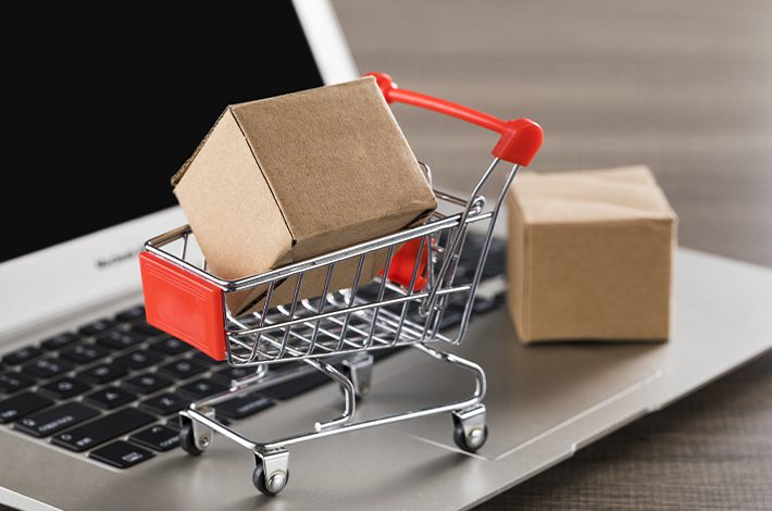 packages and cart on the laptop - Express Freight
